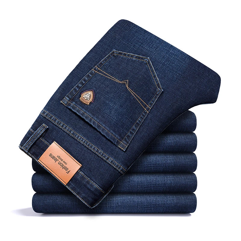 SHAN BAO 2026 autumn spring fitted straight stretch denim jeans classic style badge youth men's business casual jeans trousers