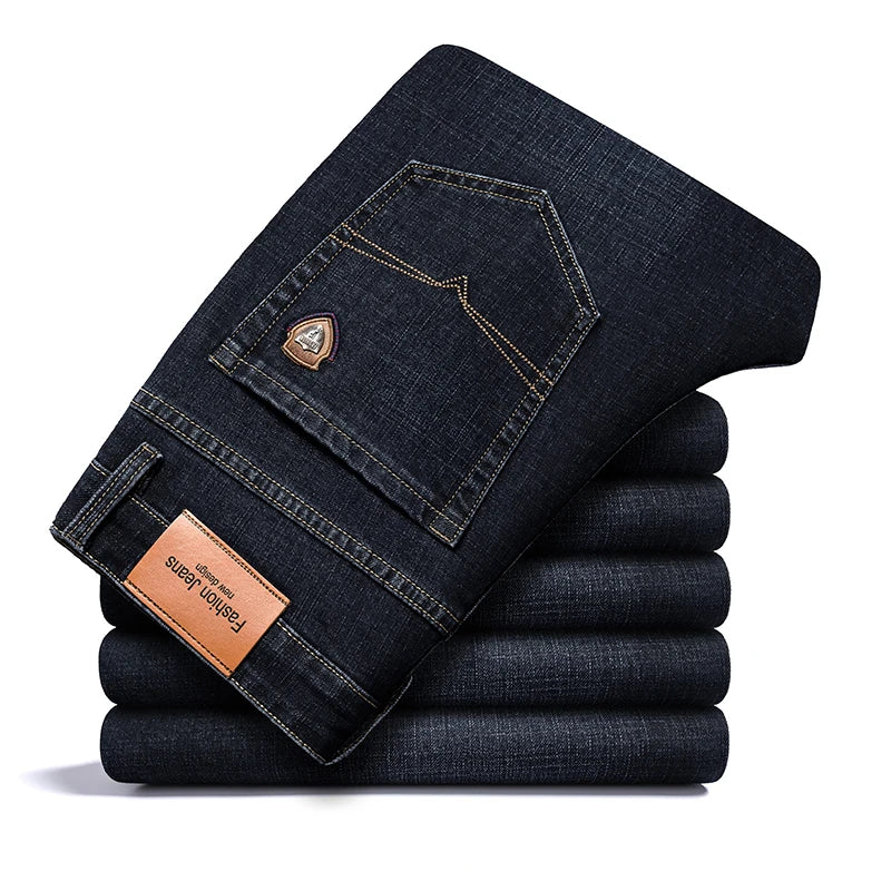 SHAN BAO 2026 autumn spring fitted straight stretch denim jeans classic style badge youth men's business casual jeans trousers