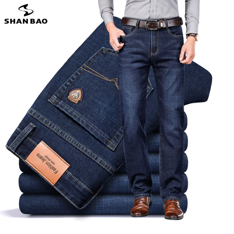 SHAN BAO 2026 autumn spring fitted straight stretch denim jeans classic style badge youth men's business casual jeans trousers