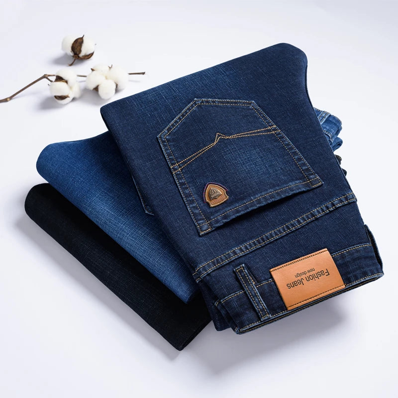 SHAN BAO 2026 autumn spring fitted straight stretch denim jeans classic style badge youth men's business casual jeans trousers